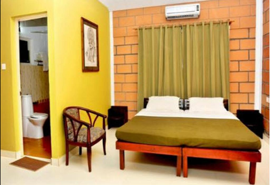 Riverine Resort Alappuzha Phòng bức ảnh
